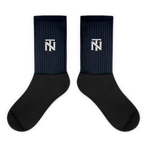 Navy NERVE & Thread Signature line crew socks with the ivory Woven NT monogram printed at the calf.