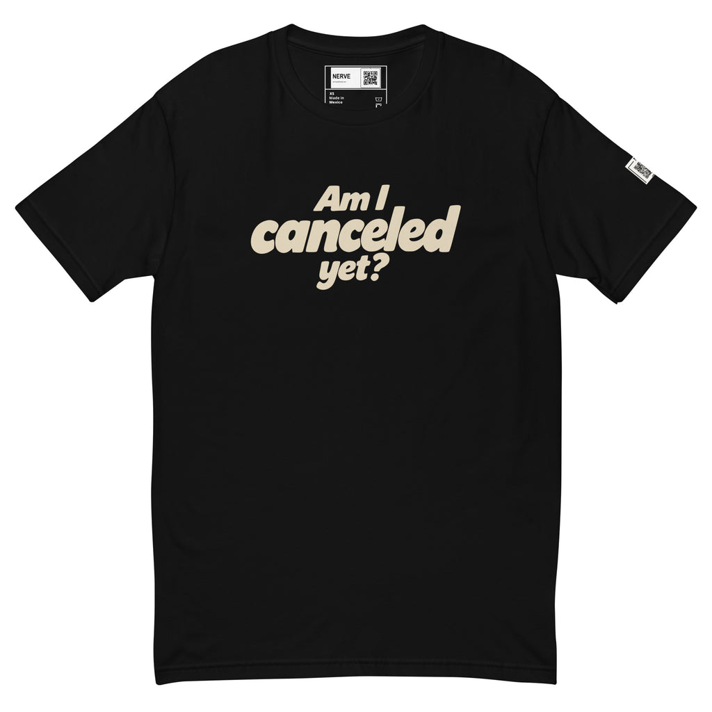 Black short-sleeve tee with cream “Am I canceled yet?” lettering on the chest.
