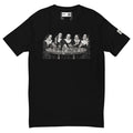 Black short-sleeve tee with a black-and-white illustration of five nuns holding cards around a round table.