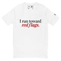 White short-sleeve tee with “I run toward red flags.” lettering, with “red flags.” printed in red.