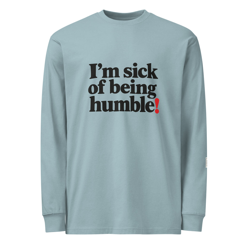 Agave long-sleeve tee with “I’m sick of being humble!” lettering and a red exclamation mark.