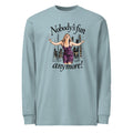 Agave long-sleeve tee with “Nobody’s fun anymore!” lettering and a woman in a purple dress with outstretched arms against a city skyline.