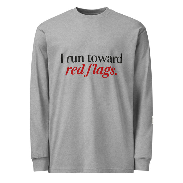 Carbon Grey long-sleeve tee with “I run toward red flags.” lettering; “red flags” is printed in red.