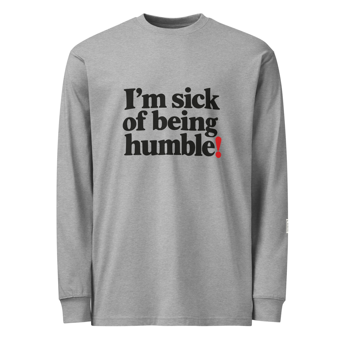 Carbon Grey long-sleeve tee with “I’m sick of being humble!” lettering and a red exclamation mark.